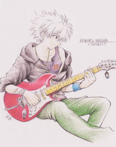 Мальчик с красивой гитарой в руках